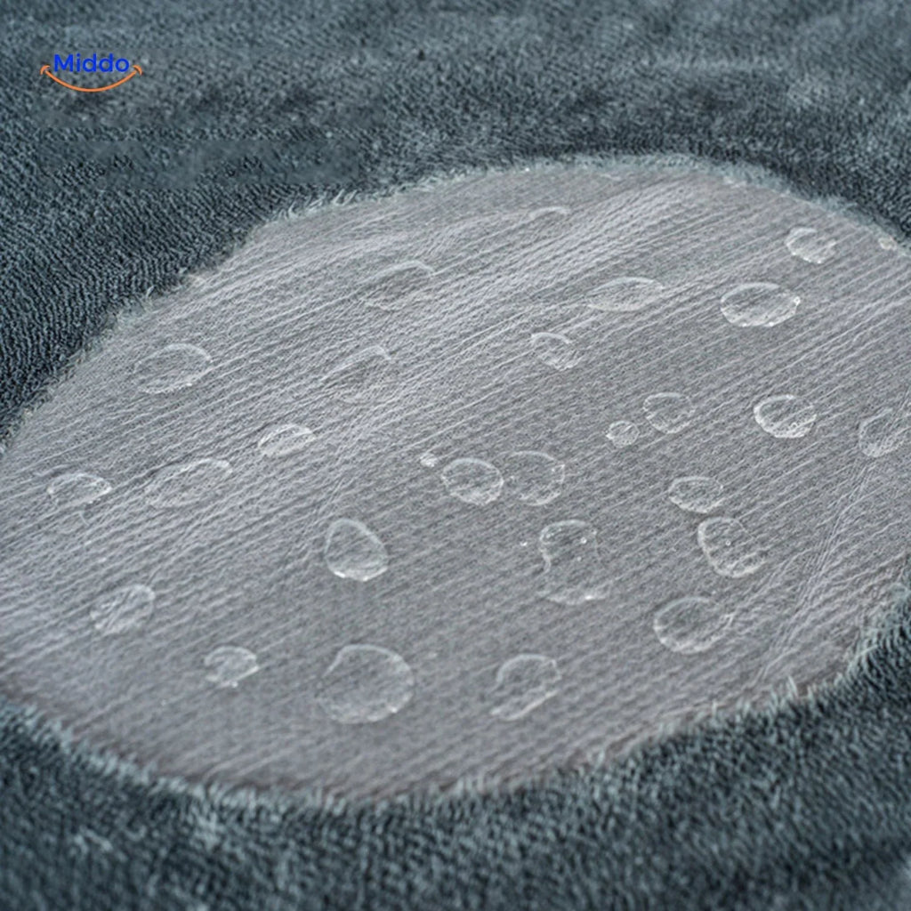 Velour throw with waterproof membrane